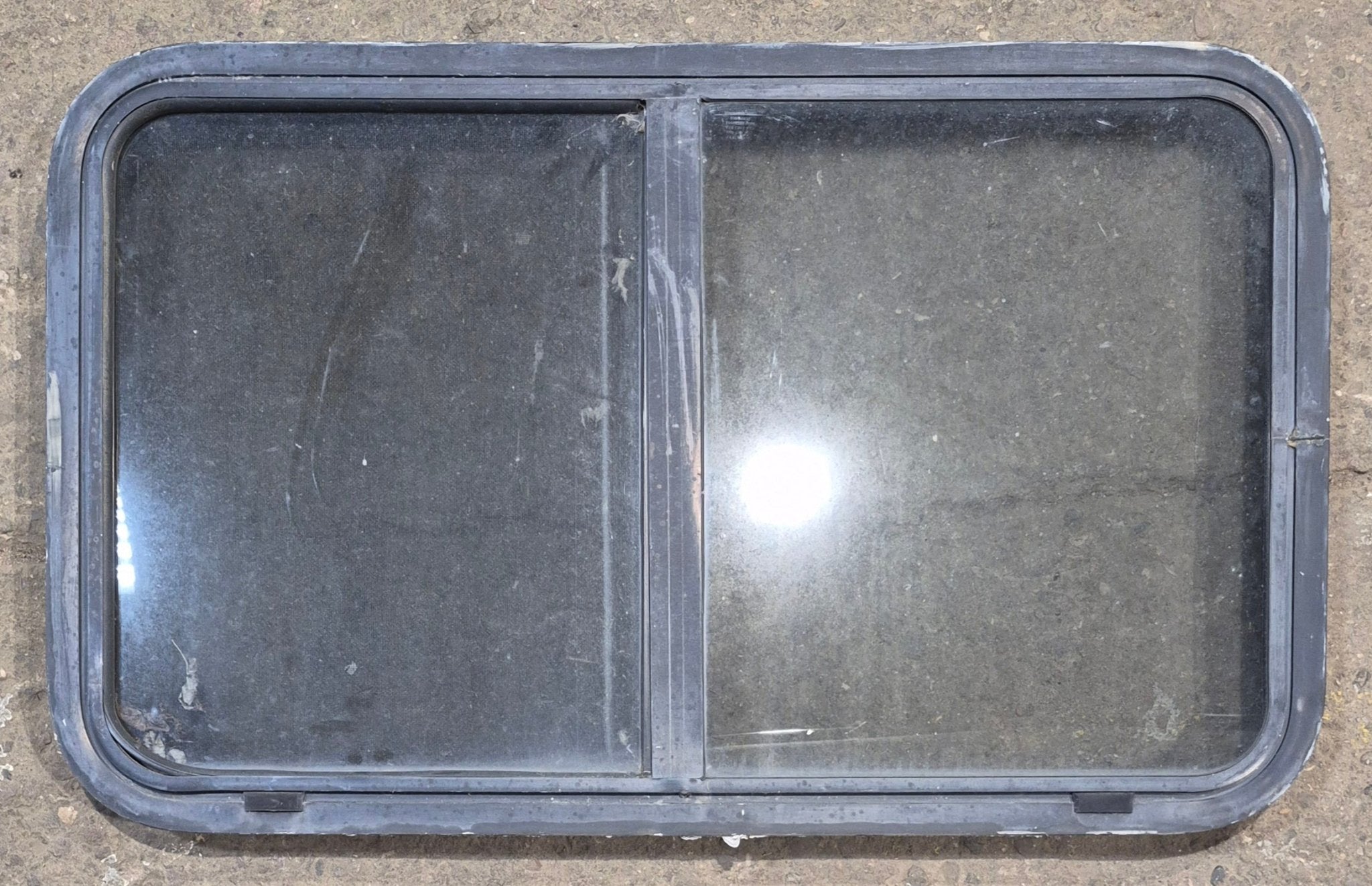 Used Black Radius Opening Window : 36 1/4" W x 21 3/4" H x 1 7/8" - Young Farts RV Parts