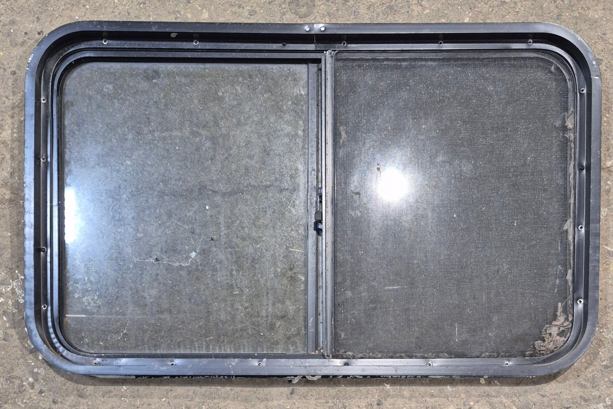 Used Black Radius Opening Window : 36 1/4" W x 21 3/4" H x 1 7/8" - Young Farts RV Parts