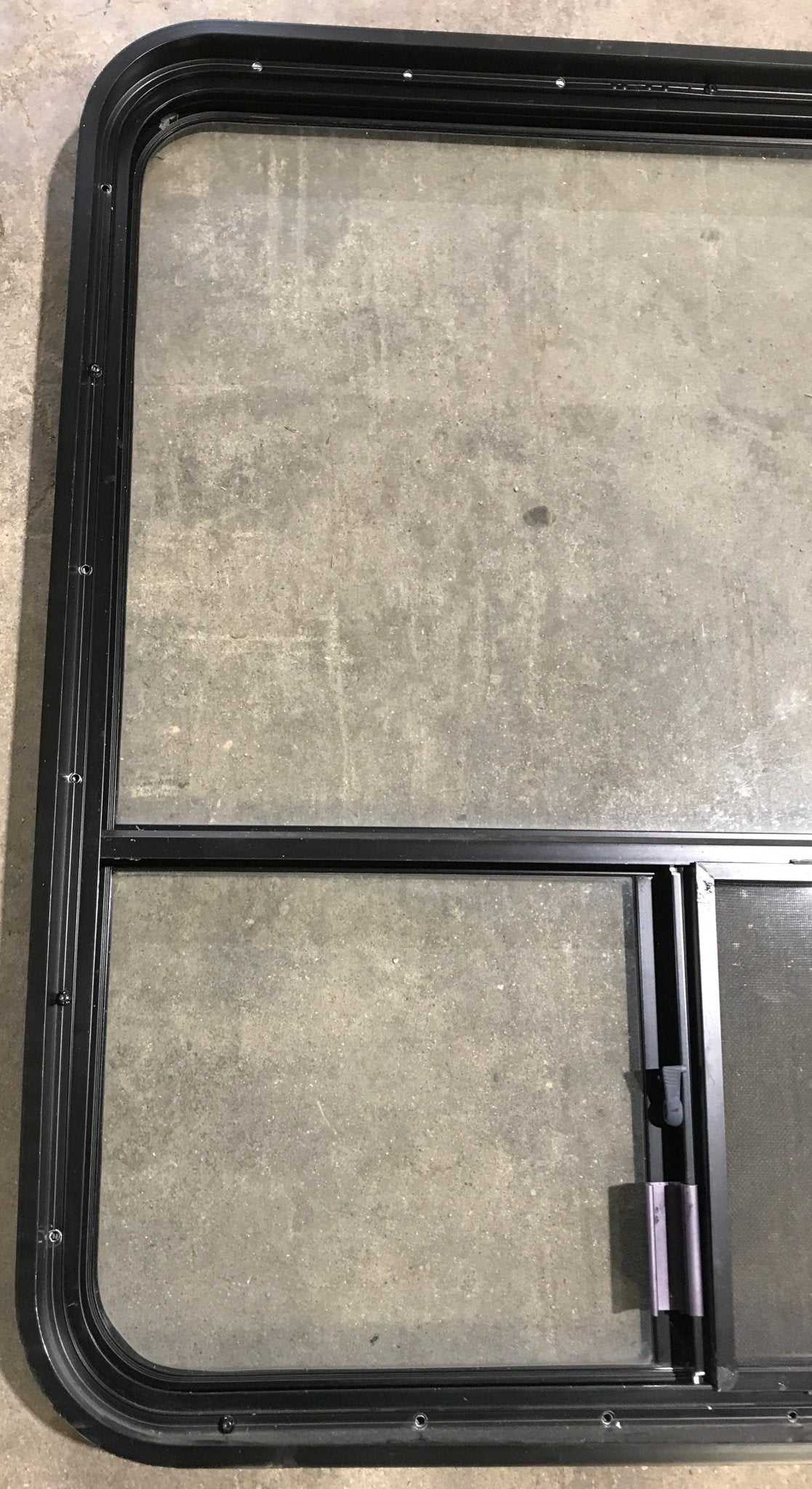 Used Black Radius Opening Window : 36 1/4" W x 30 1/4" H x 1 7/8" D - Young Farts RV Parts