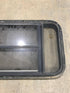 Used Black Radius Opening Window : 37" W x 19 1/4" H x 1 1/4" - Young Farts RV Parts