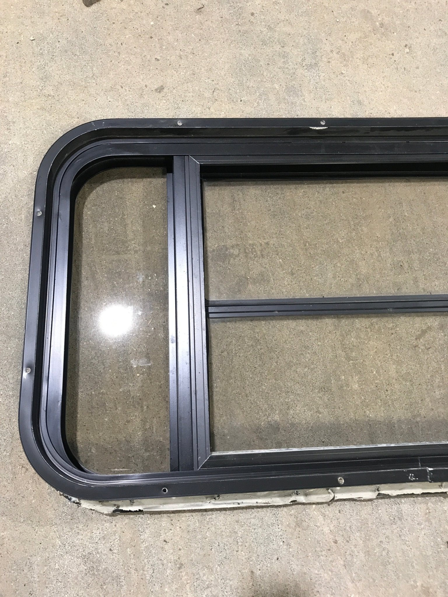 Used Black Radius Opening Window : 37" W x 19 1/4" H x 1 1/4" - Young Farts RV Parts