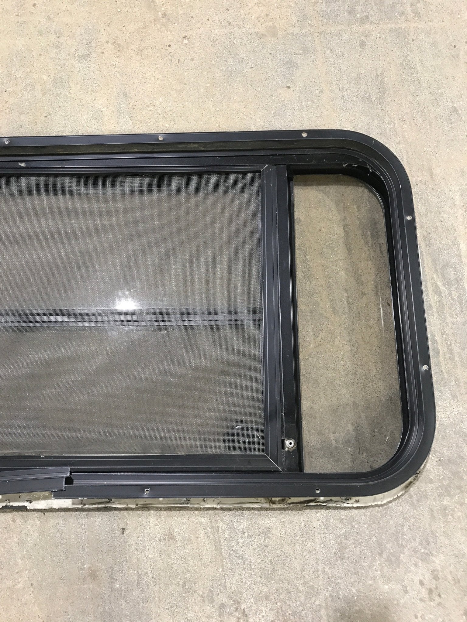 Used Black Radius Opening Window : 37" W x 19 1/4" H x 1 1/4" - Young Farts RV Parts