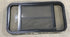 Used Black Radius Opening Window : 37" W x 19 1/4" H x 1 1/4" - Young Farts RV Parts