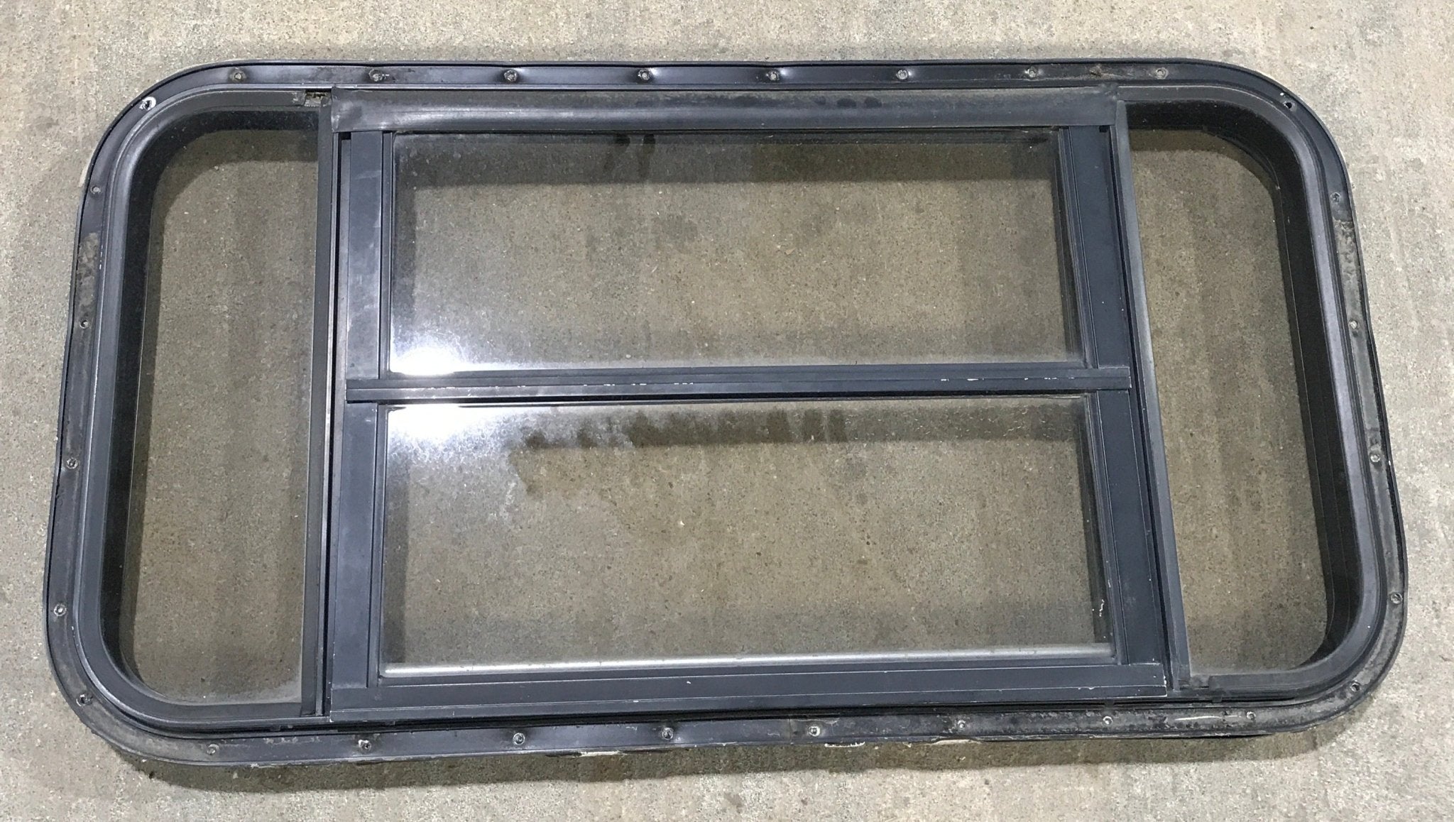 Used Black Radius Opening Window : 37" W x 19 1/4" H x 1 1/4" - Young Farts RV Parts