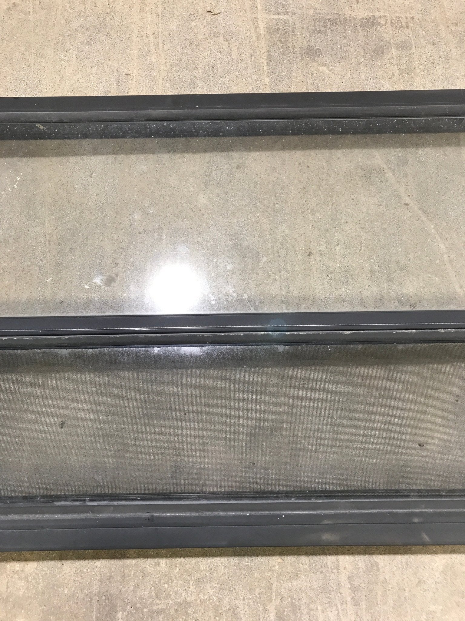 Used Black Radius Opening Window : 41 1/2" W x 21 1/2" H x 2" D - Young Farts RV Parts