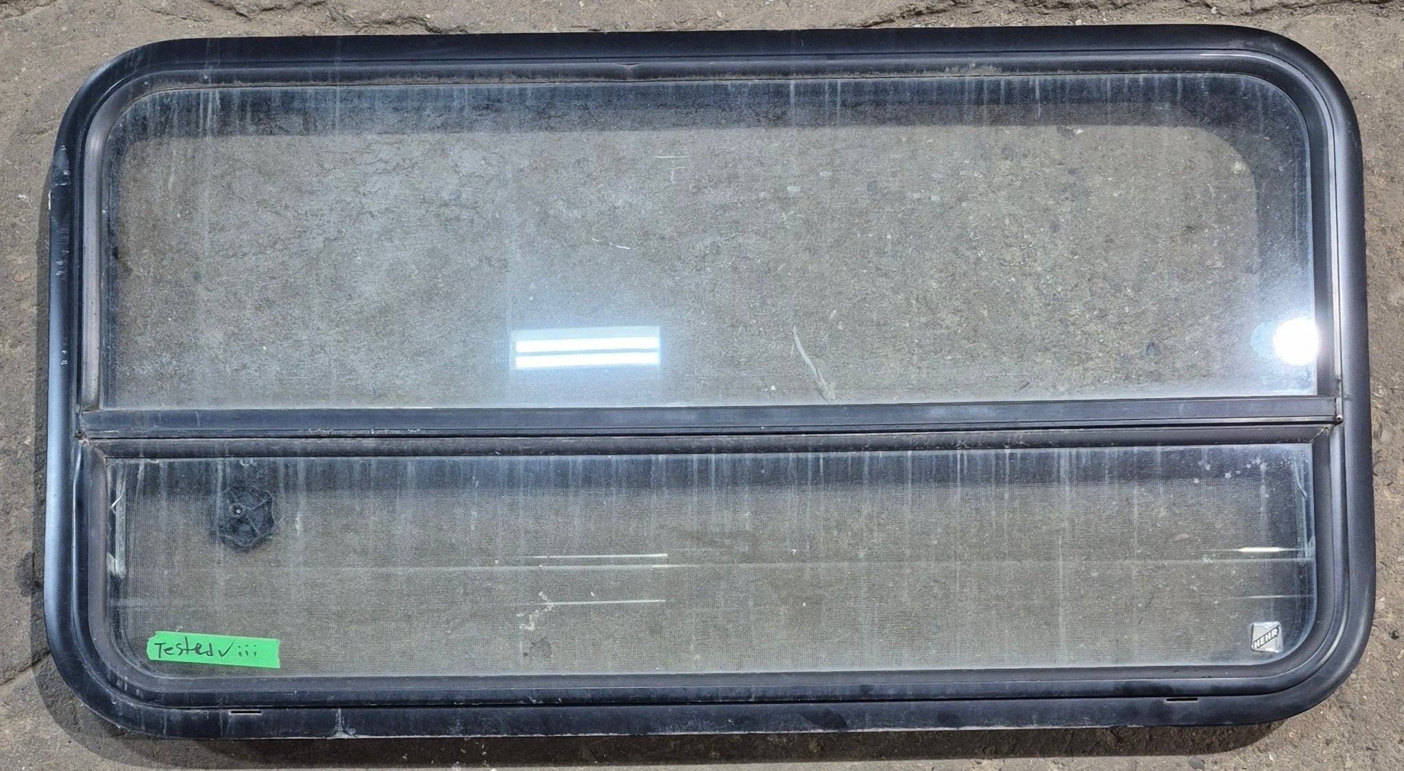 Used Black Radius Opening Window : 41 1/4" W x 21 1/2" H x 1 7/8" D - Young Farts RV Parts