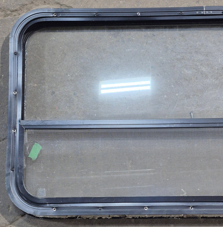 Used Black Radius Opening Window : 41 1/4" W x 21 1/2" H x 1 7/8" D - Young Farts RV Parts