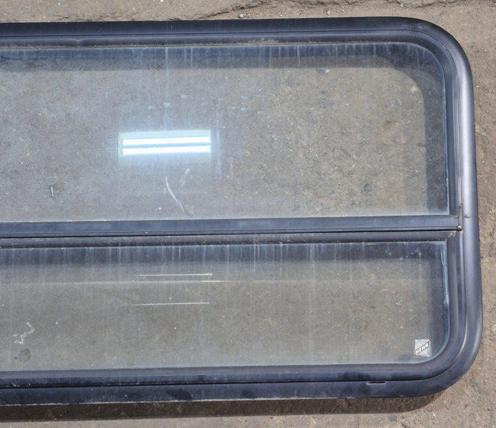 Used Black Radius Opening Window : 41 1/4" W x 21 1/2" H x 1 7/8" D - Young Farts RV Parts