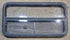 Used Black Radius Opening Window : 41 1/4" W x 21 1/4" H x 1 5/8" - Young Farts RV Parts