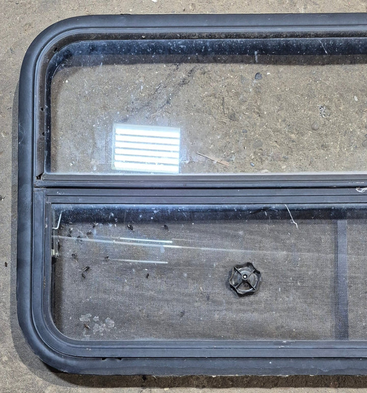 Used Black Radius Opening Window : 41 1/4" W x 21 1/4" H x 1 5/8" - Young Farts RV Parts