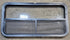 Used Black Radius Opening Window : 41 1/4" W x 21 1/4" H x 1 5/8" - Young Farts RV Parts