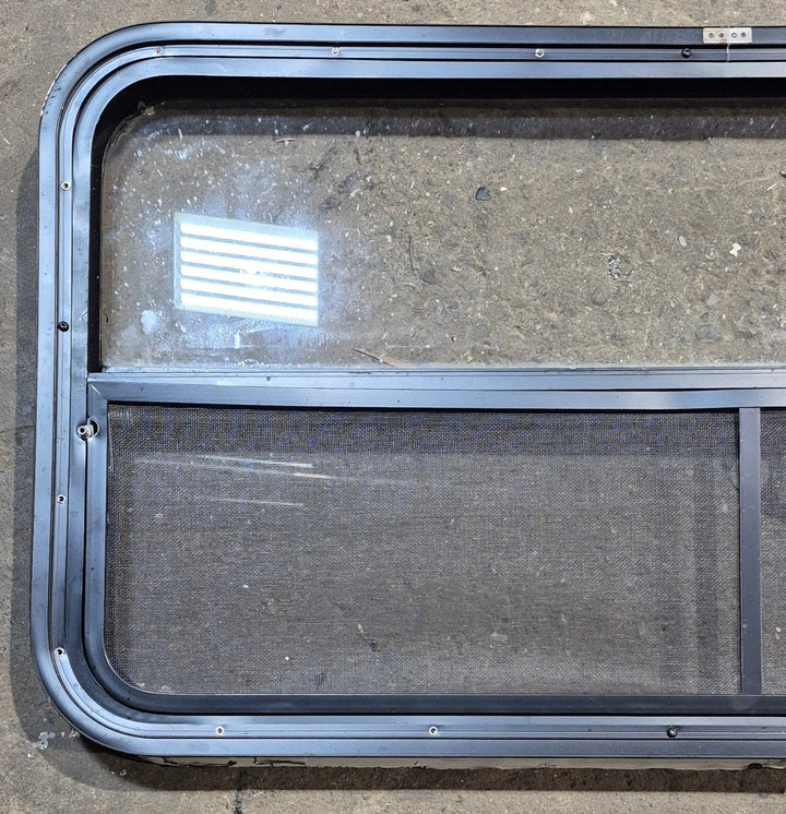 Used Black Radius Opening Window : 41 1/4" W x 21 1/4" H x 1 5/8" - Young Farts RV Parts
