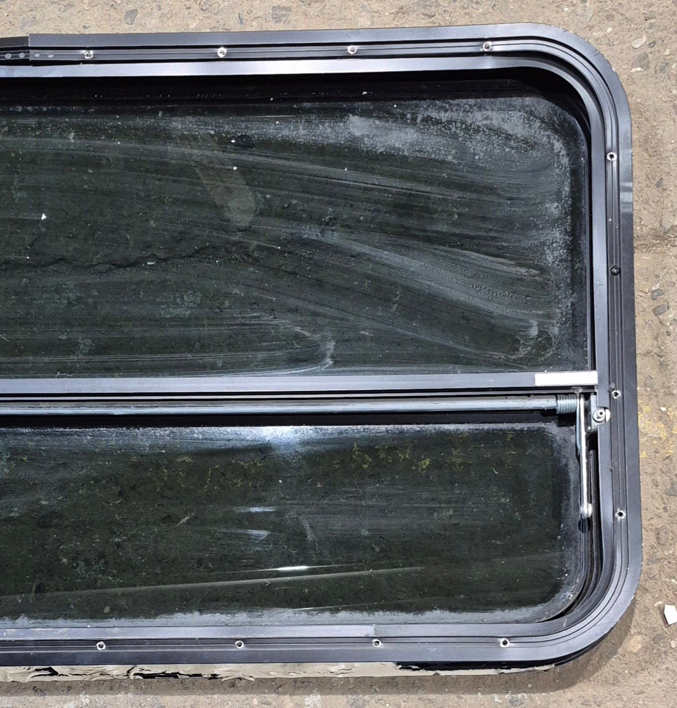 Used Black Radius Opening Window : 41 1/4" W x 21 1/4" H x 2" - Young Farts RV Parts