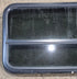 Used Black Radius Opening Window : 41 1/4" W x 21 1/4" H x 2" - Young Farts RV Parts