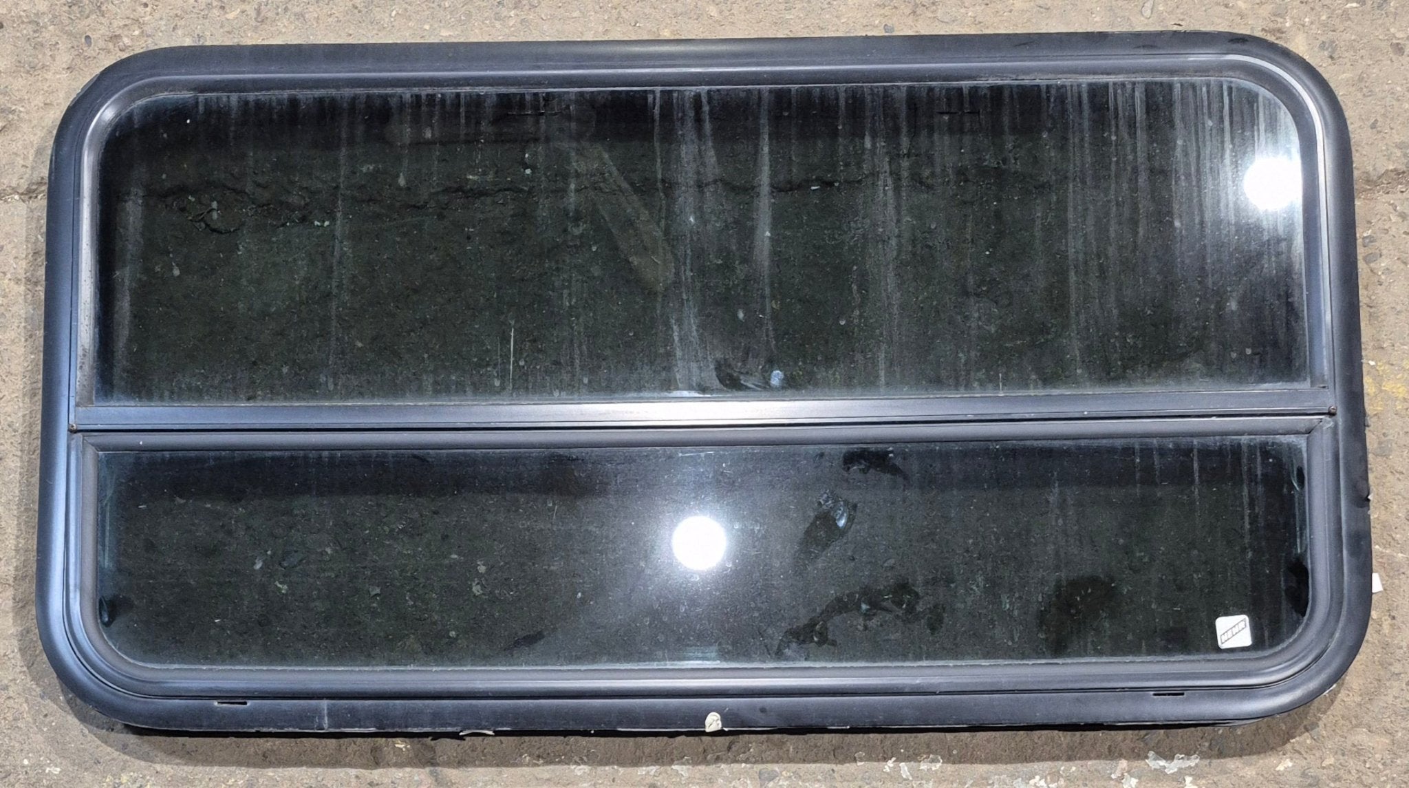 Used Black Radius Opening Window : 41 1/4" W x 21 1/4" H x 2" - Young Farts RV Parts
