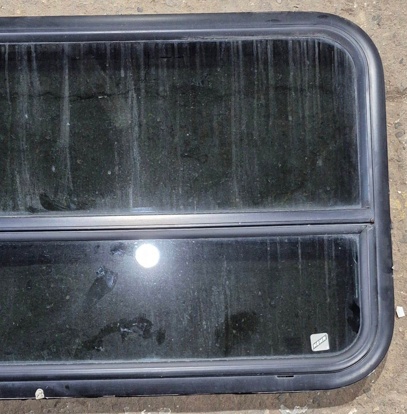 Used Black Radius Opening Window : 41 1/4" W x 21 1/4" H x 2" - Young Farts RV Parts