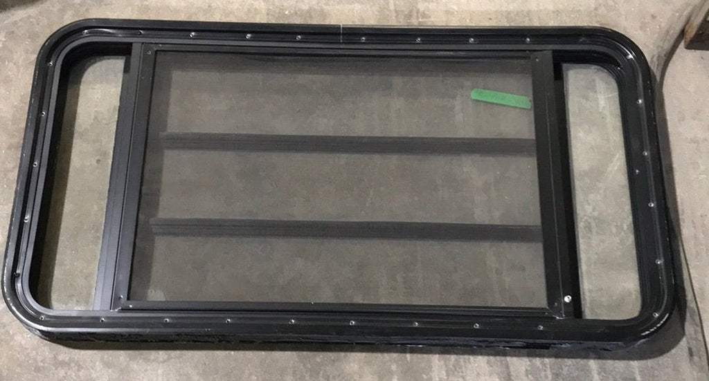 Used Black Radius Opening Window : 41 1/4" W x 21 1/4" H x 2" D - Young Farts RV Parts