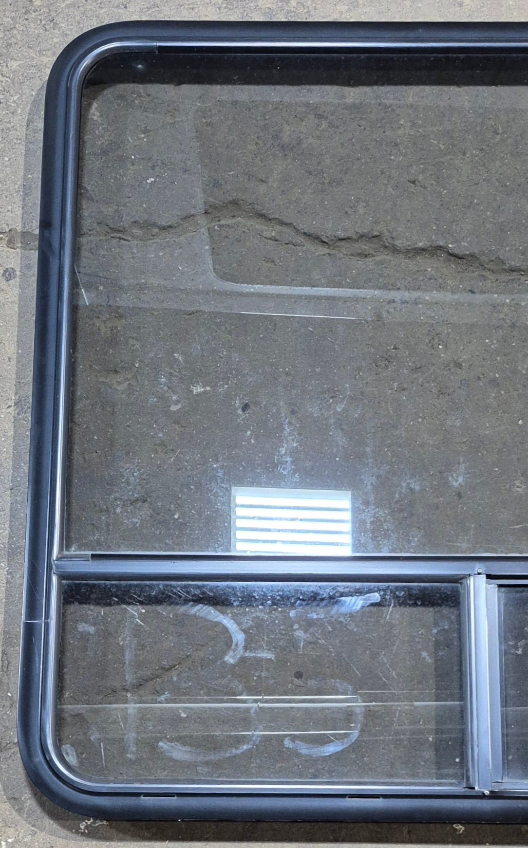 Used Black Radius Opening Window : 41 1/4" W x 39 1/2" H x 1 3/4" - Young Farts RV Parts