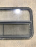 Used Black Radius Opening Window : 42 1/2" W x 22 1/2" H x 2" D - Young Farts RV Parts