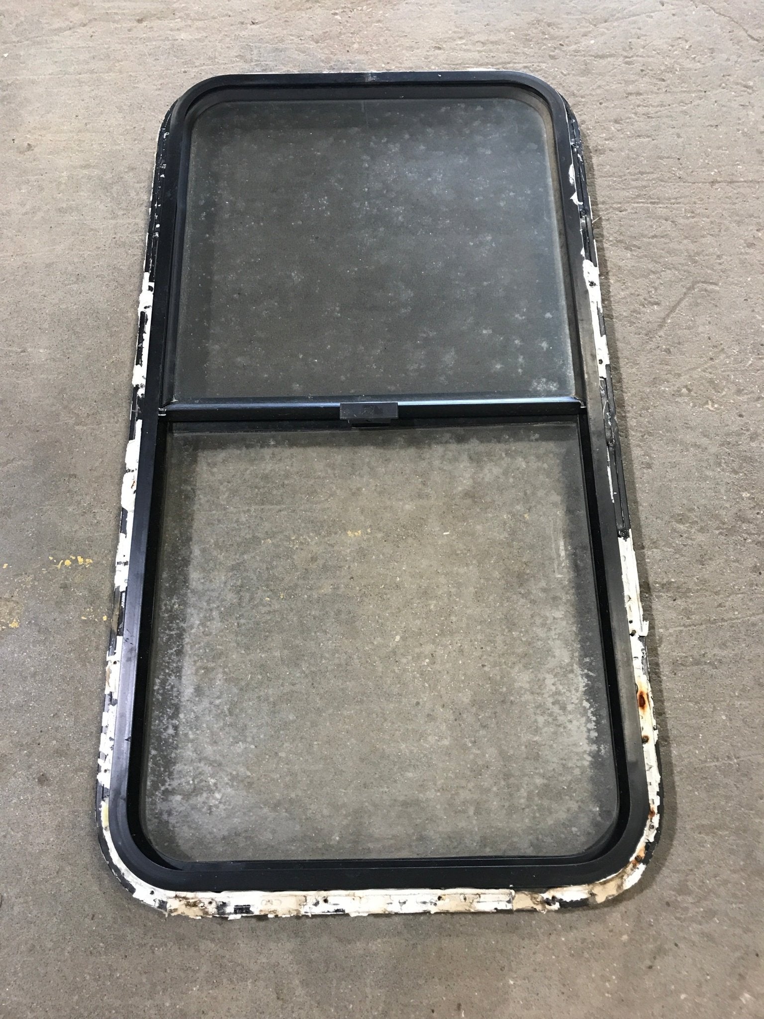 Used Black Radius Opening Window : 42 1/2" W x 22 1/2" H x 2" D - Young Farts RV Parts