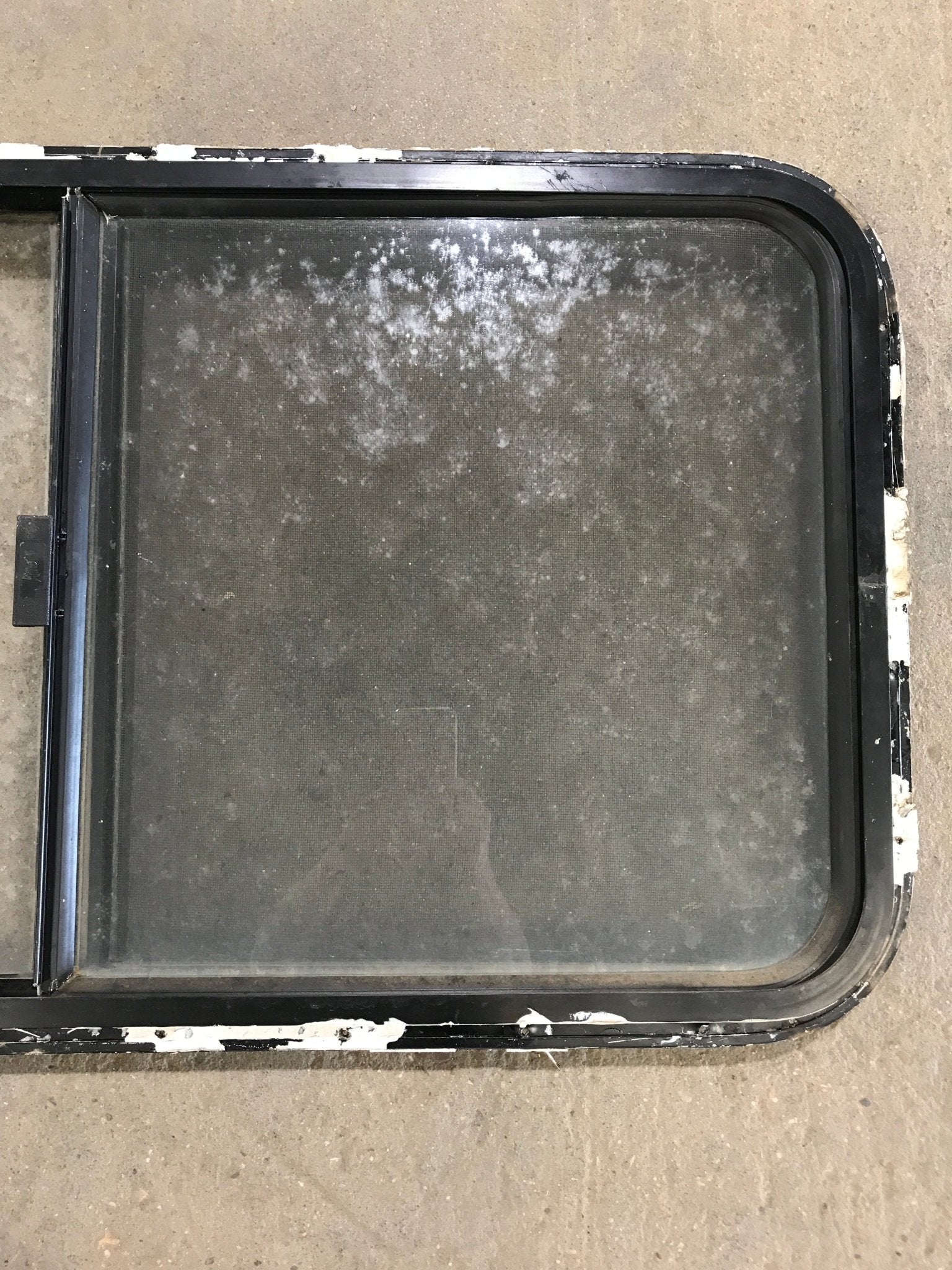 Used Black Radius Opening Window : 42 1/2" W x 22 1/2" H x 2" D - Young Farts RV Parts