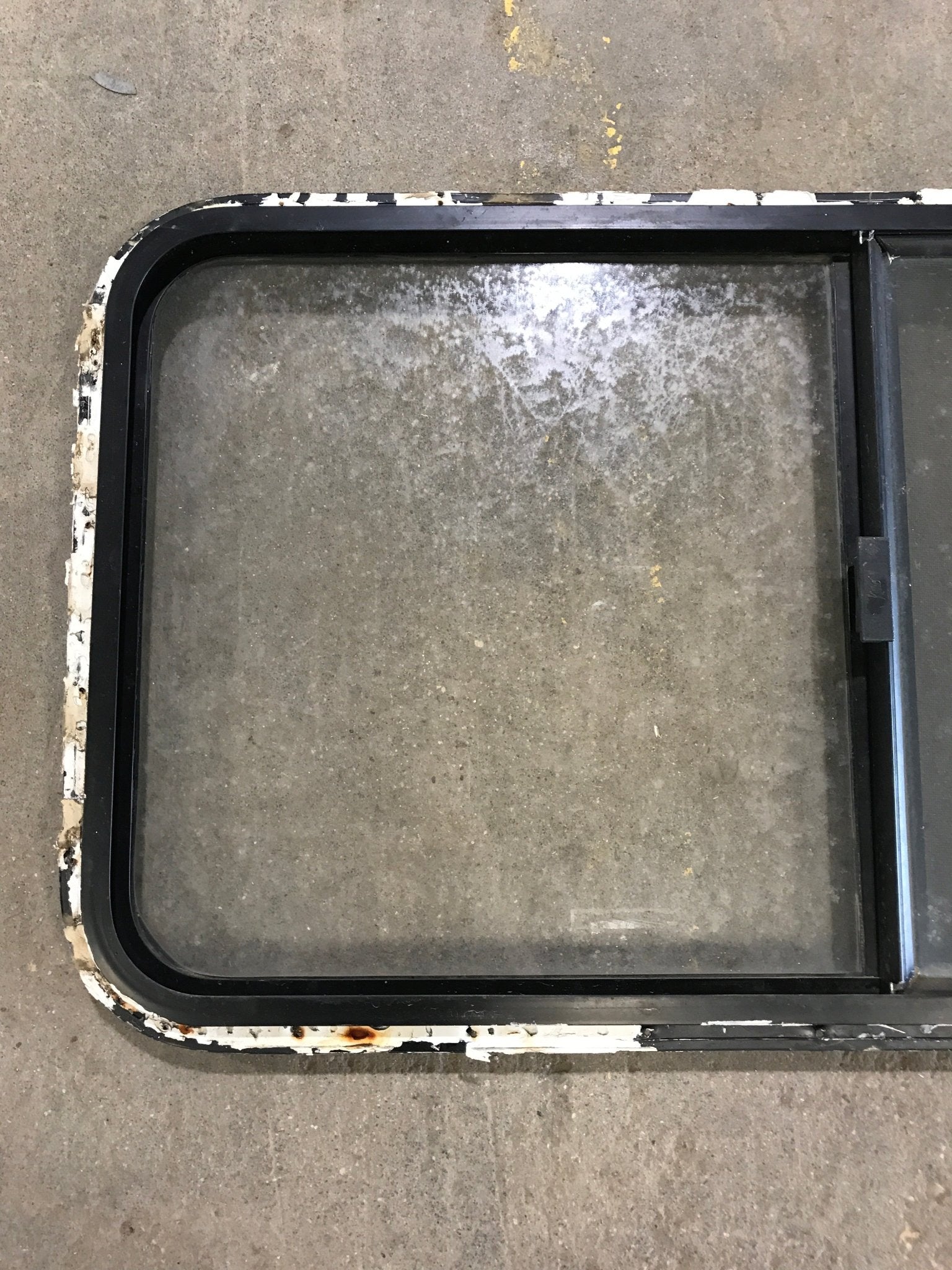 Used Black Radius Opening Window : 42 1/2" W x 22 1/2" H x 2" D - Young Farts RV Parts