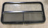 Used Black Radius Opening Window : 42 1/2" W x 22 1/2" H x 2" D - Young Farts RV Parts