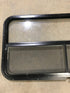 Used Black Radius Opening Window : 42 1/2" W x 22 1/2" H x 2" D - Young Farts RV Parts
