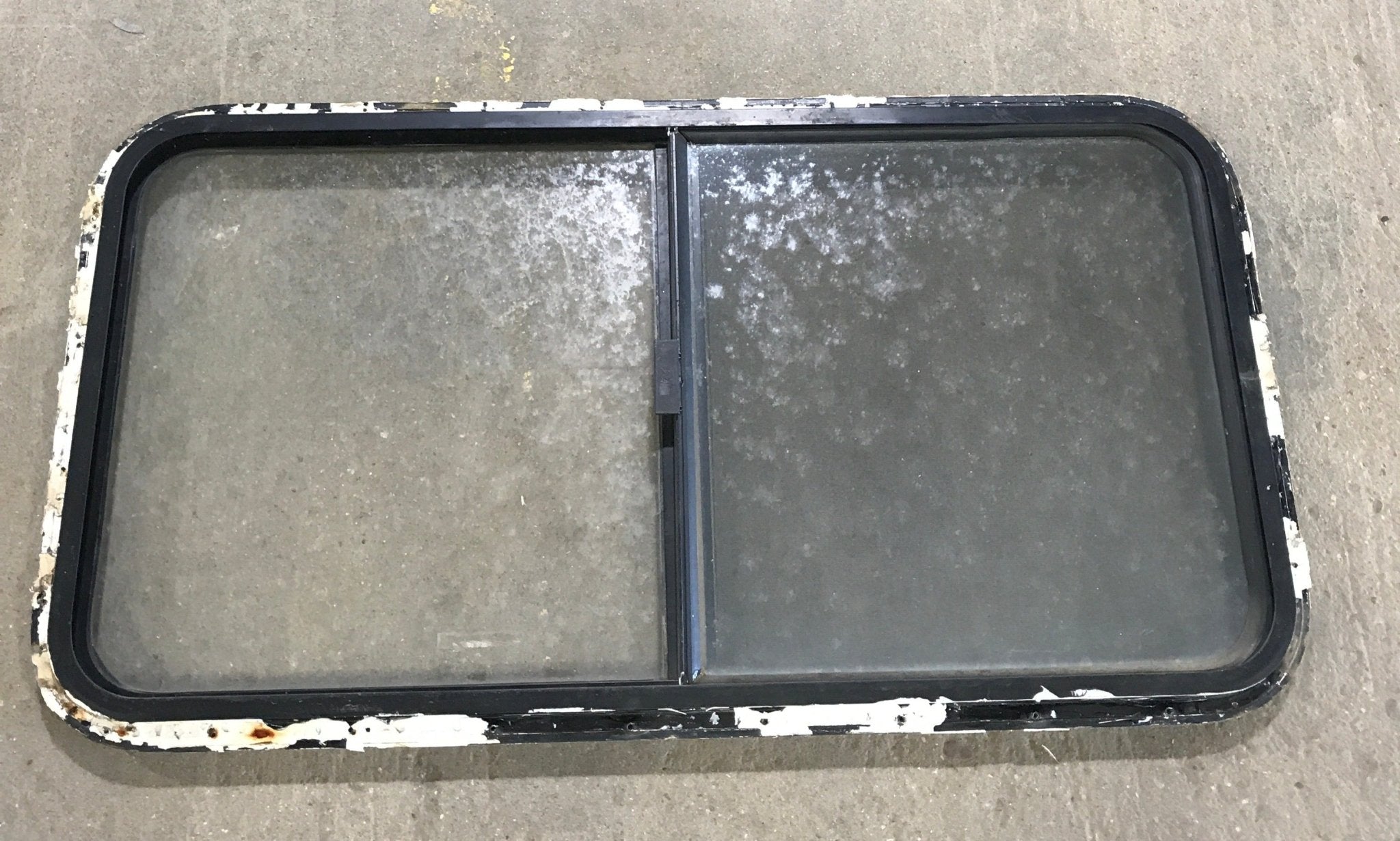 Used Black Radius Opening Window : 42 1/2" W x 22 1/2" H x 2" D - Young Farts RV Parts