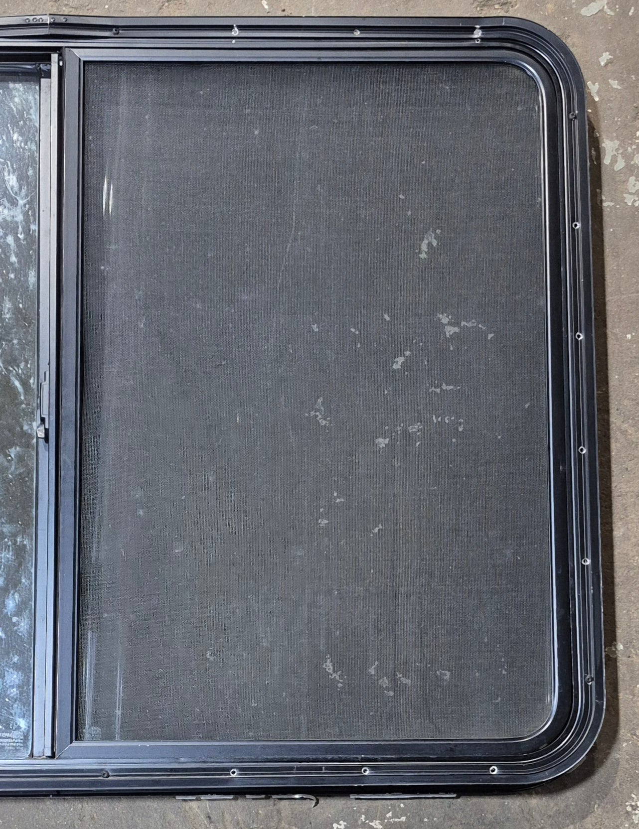 Used Black Radius Opening Window : 42 1/2" W x 34" H x 1 3/4" D - Young Farts RV Parts