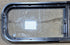 Used Black Radius Opening Window : 42 1/4" W x 11 3/4" H x 1 7/8" - Young Farts RV Parts