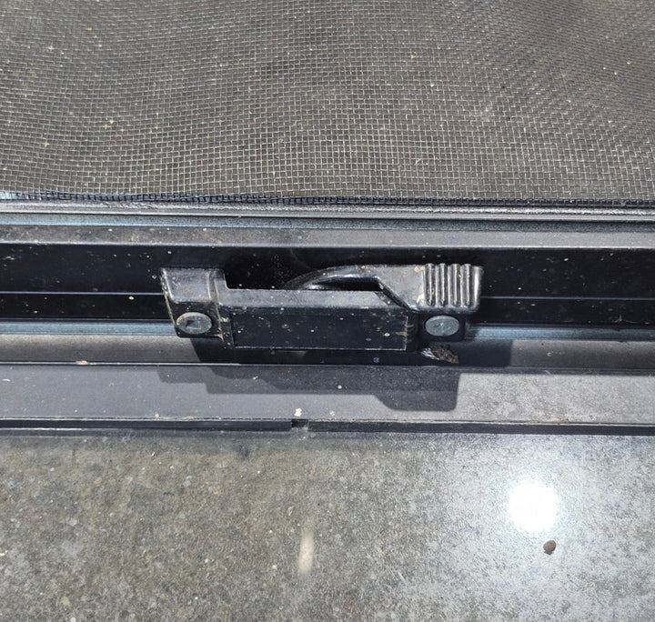 Used Black Radius Opening Window : 42 1/4" W x 11 3/4" H x 1 7/8" - Young Farts RV Parts