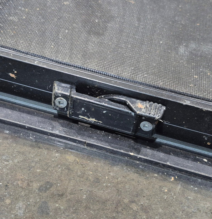 Used Black Radius Opening Window : 42 1/4" W x 11 3/4" H x 1 7/8" - Young Farts RV Parts