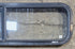 Used Black Radius Opening Window : 42 1/4" W x 11 3/4" H x 1 7/8" - Young Farts RV Parts
