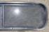 Used Black Radius Opening Window : 42 1/4" W x 11 3/4" H x 1 7/8" - Young Farts RV Parts