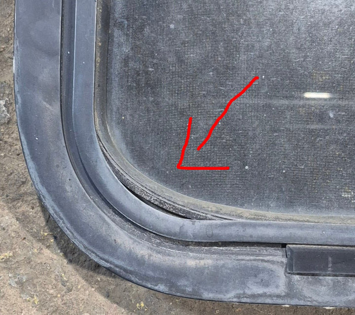 Used Black Radius Opening Window : 42 1/4" W x 11 3/4" H x 1 7/8" - Young Farts RV Parts