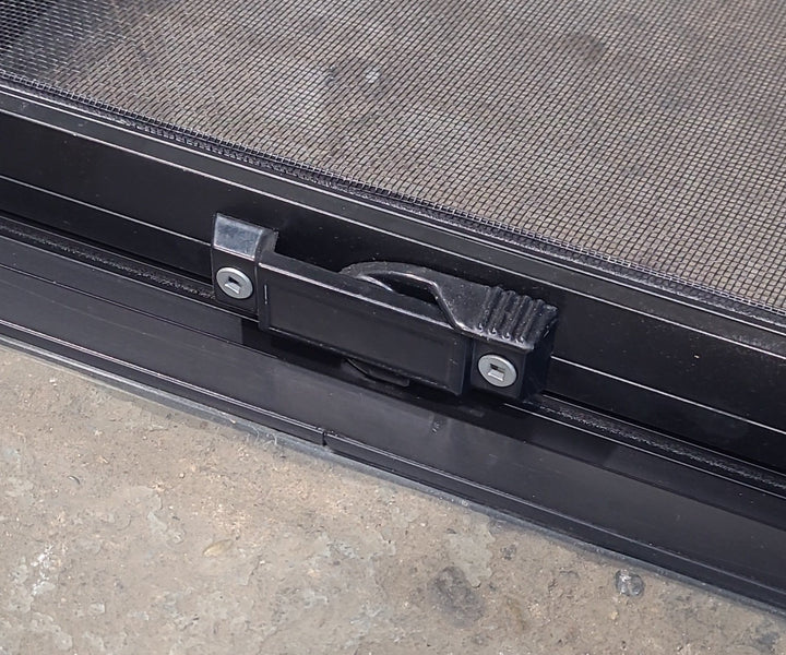 Used Black Radius Opening Window : 42 1/4" W x 11 3/4" H x 1 7/8" D - Young Farts RV Parts