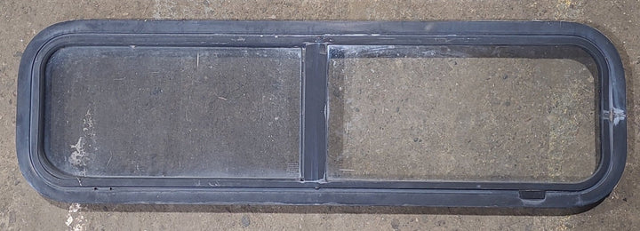 Used Black Radius Opening Window : 42 1/4" W x 11 3/4" H x 1 7/8" D - Young Farts RV Parts