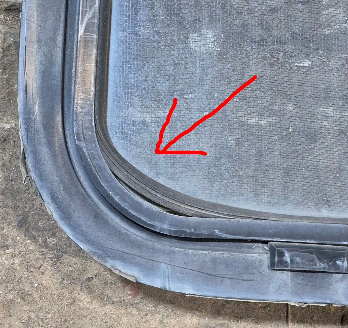 Used Black Radius Opening Window : 42 1/4" W x 11 3/4" H x 2" - Young Farts RV Parts