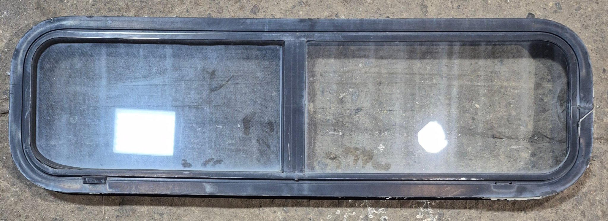 Used Black Radius Opening Window : 42 1/4" W x 11 3/4" H x 2" - Young Farts RV Parts