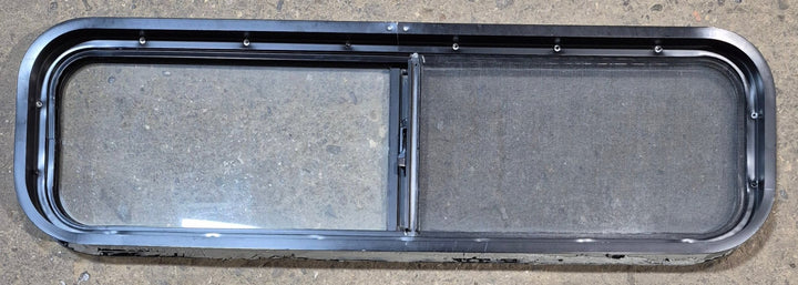 Used Black Radius Opening Window : 42 1/4" W x 11 3/4" H x 2" - Young Farts RV Parts