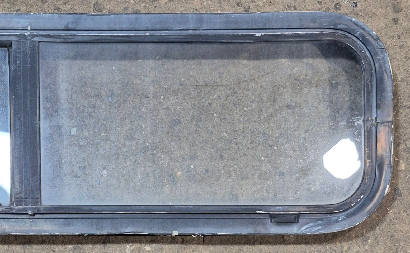 Used Black Radius Opening Window : 42 1/4" W x 11 3/4" H x 2" - Young Farts RV Parts