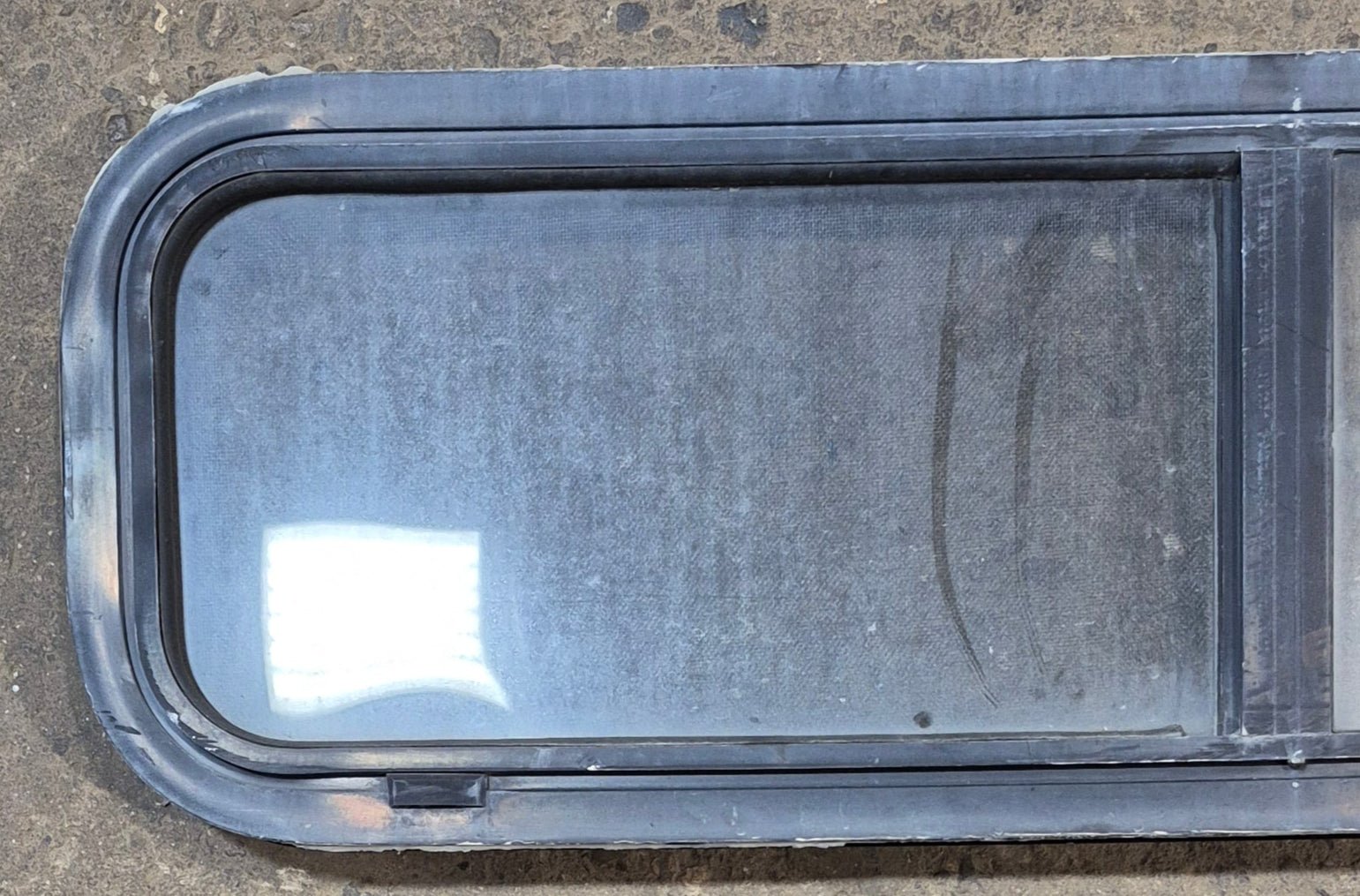 Used Black Radius Opening Window : 42 1/4" W x 11 3/4" H x 2" - Young Farts RV Parts