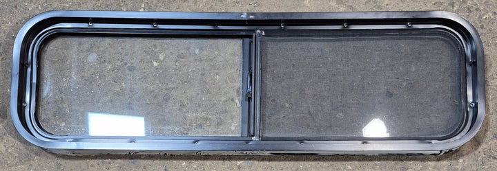 Used Black Radius Opening Window : 42 1/4" W x 11 3/4" H x 2" - Young Farts RV Parts