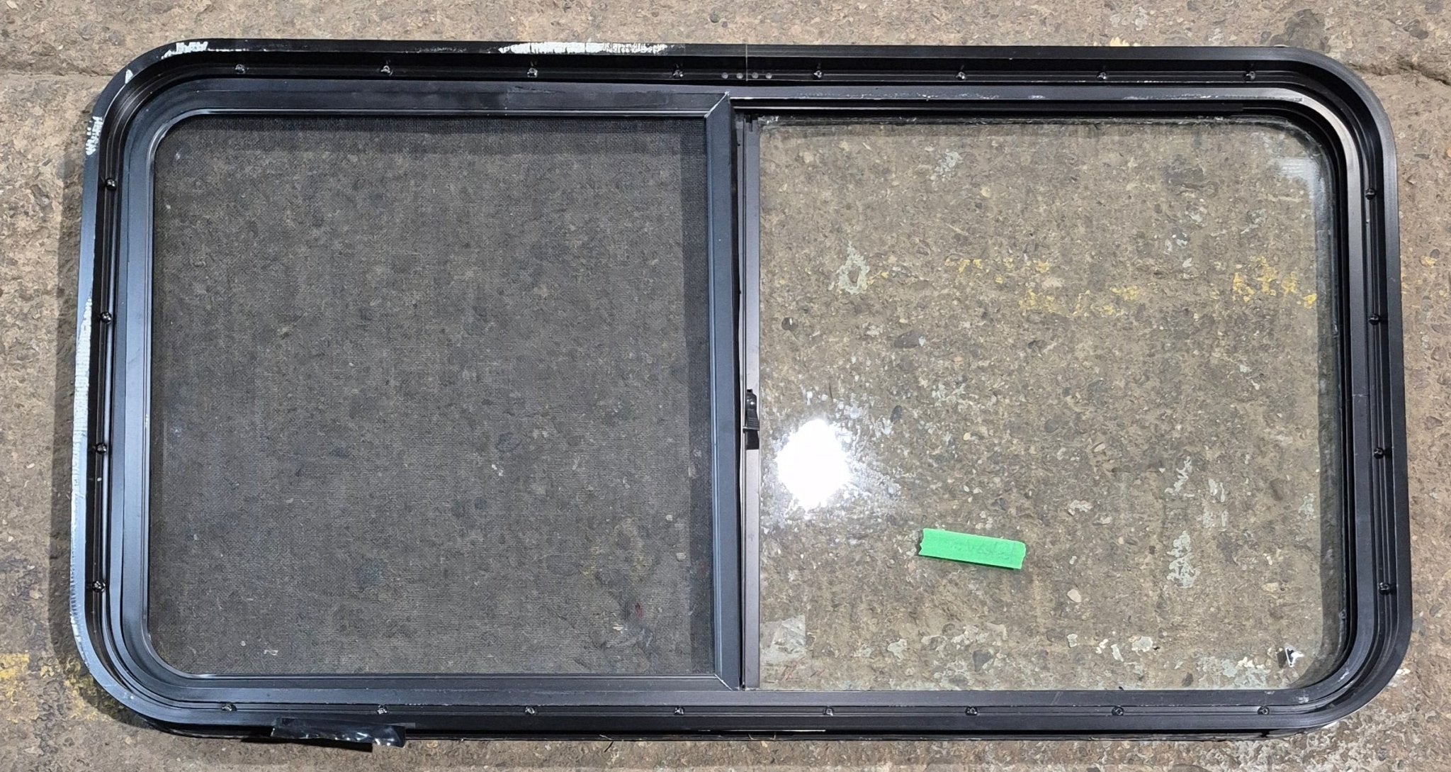 Used Black Radius Opening Window : 42 1/4" W x 21 3/4" H x 1 3/4" - Young Farts RV Parts