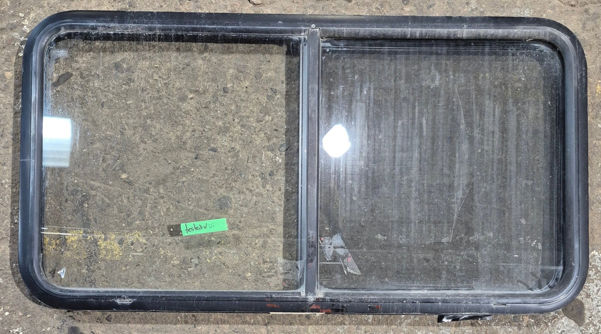 Used Black Radius Opening Window : 42 1/4" W x 21 3/4" H x 1 3/4" - Young Farts RV Parts