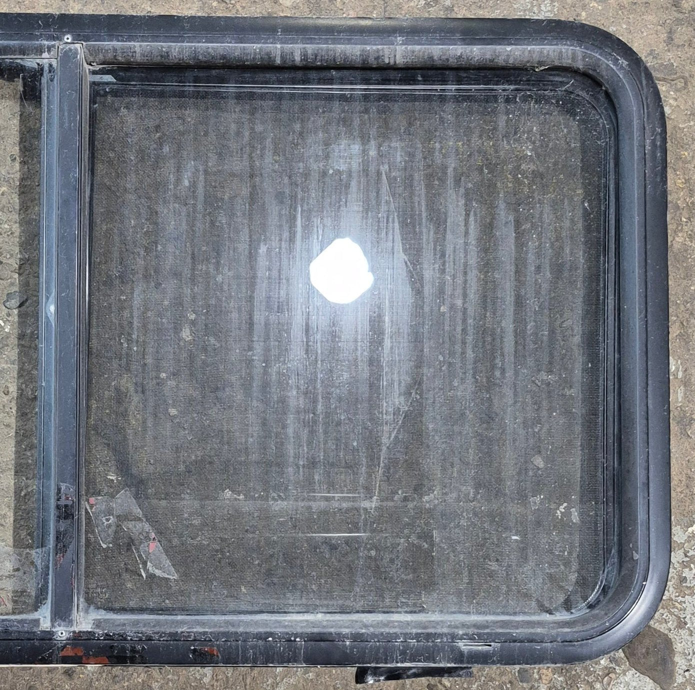 Used Black Radius Opening Window : 42 1/4" W x 21 3/4" H x 1 3/4" - Young Farts RV Parts