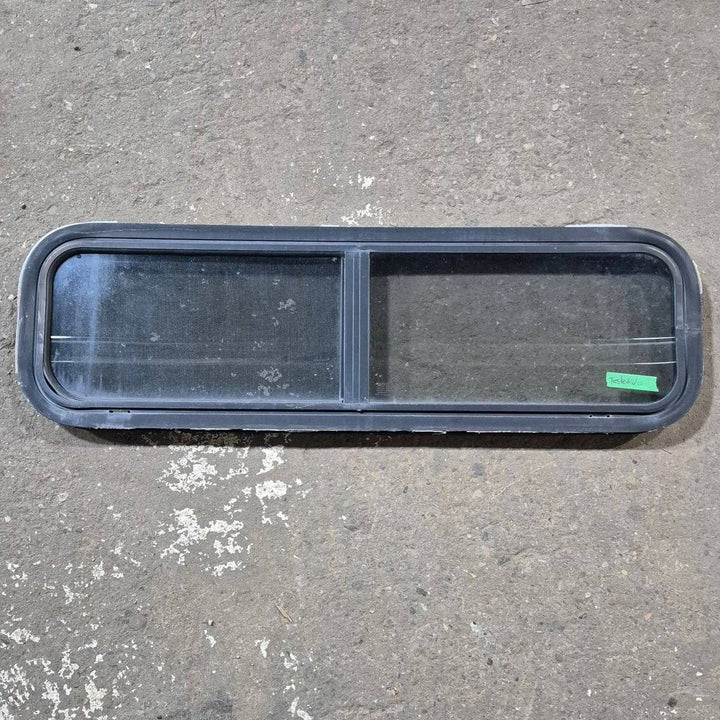 Used Black Radius Opening Window - 42 X 11 3/4 X 2 - Young Farts RV Parts