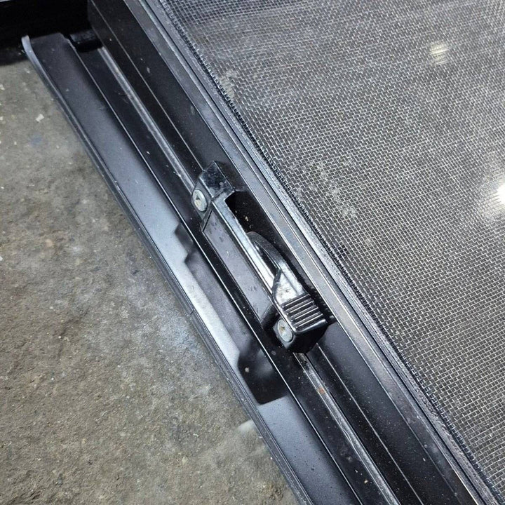Used Black Radius Opening Window - 42 X 11 3/4 X 2 - Young Farts RV Parts