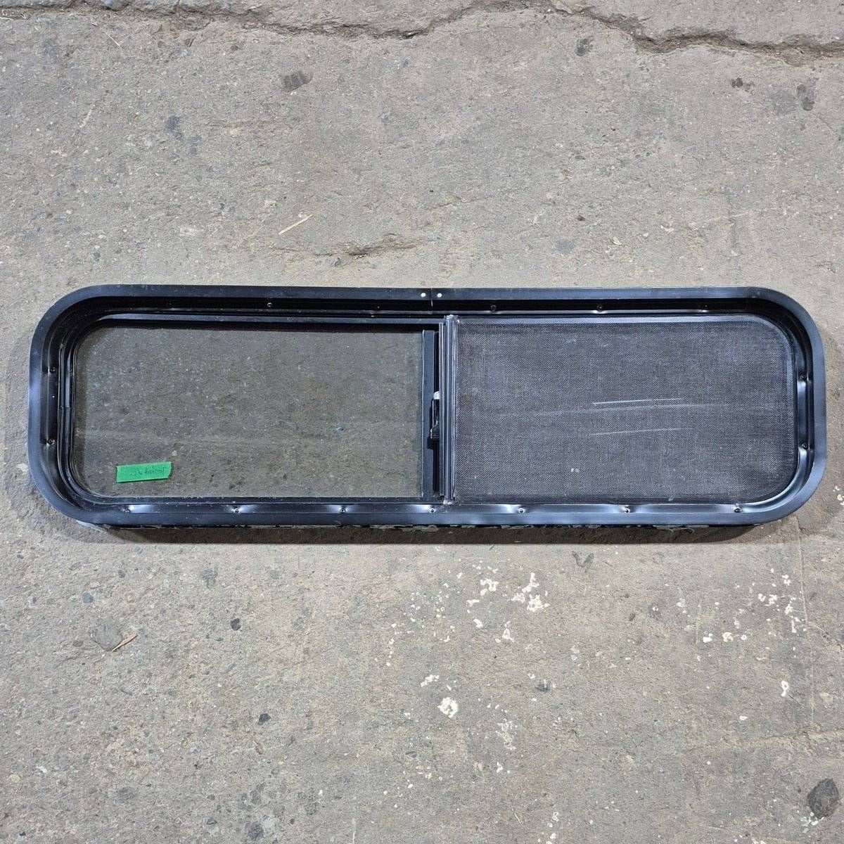 Used Black Radius Opening Window - 42 X 11 3/4 X 2 - Young Farts RV Parts